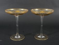 Two gilt decorated glass tazzas.