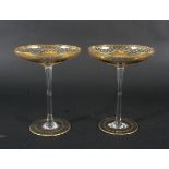 Two gilt decorated glass tazzas.