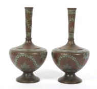 A pair of late 19th/early 20th century bronzed Indian metal vases.