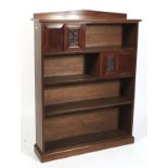 An Edwardian mahogany free standing open bookcase.