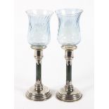 A pair of Edward VII silver and hardstone mounted candlesticks.