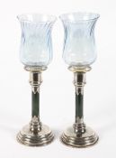 A pair of Edward VII silver and hardstone mounted candlesticks.