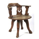 A carved oak swivel chair, late 19th/early 20th century.