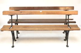 Two 19th century iron and pitch pine tram swingback pew/bench.