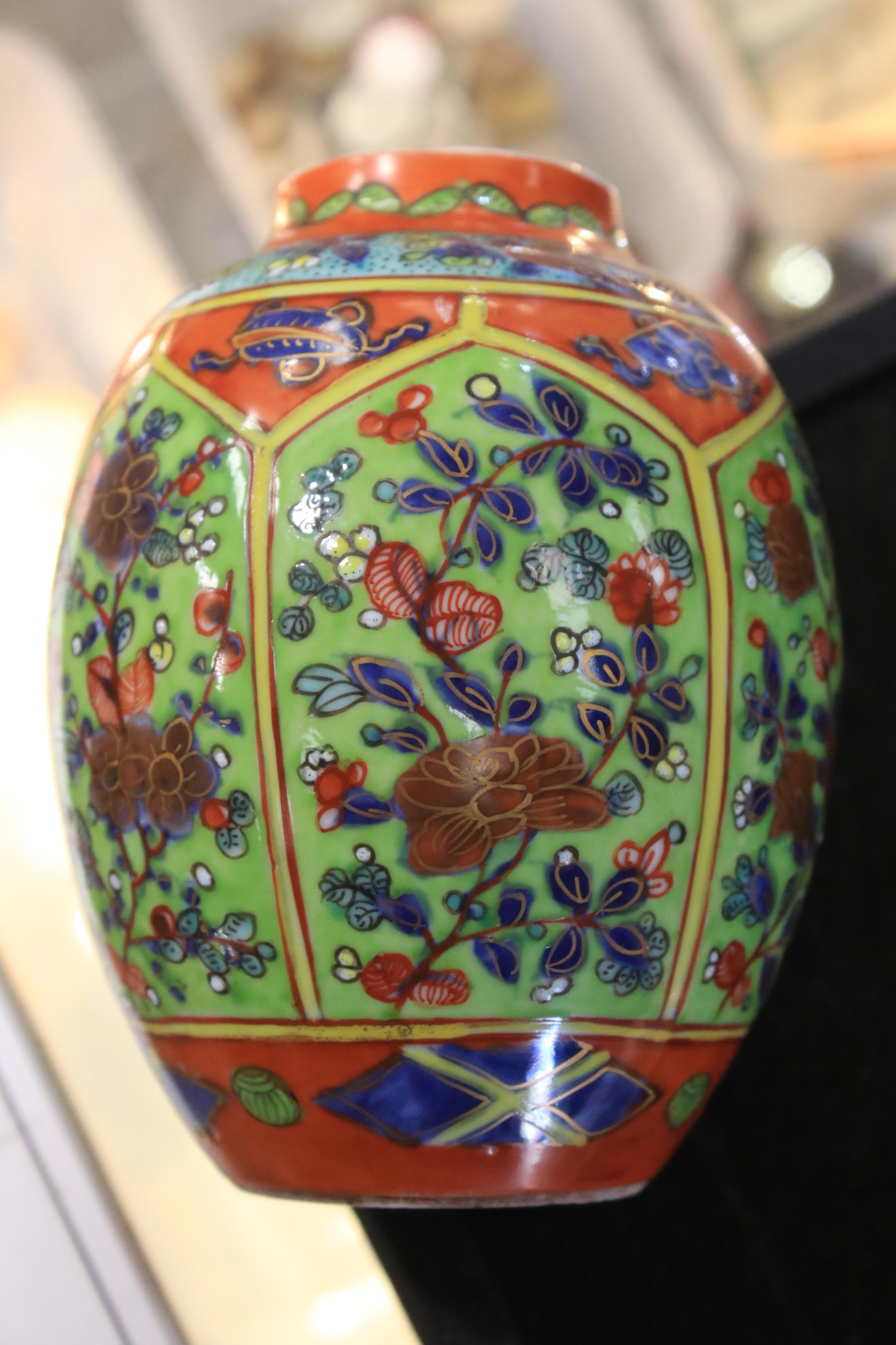 A Qing Dynasty porcelain oviform vase and cover. - Image 9 of 15