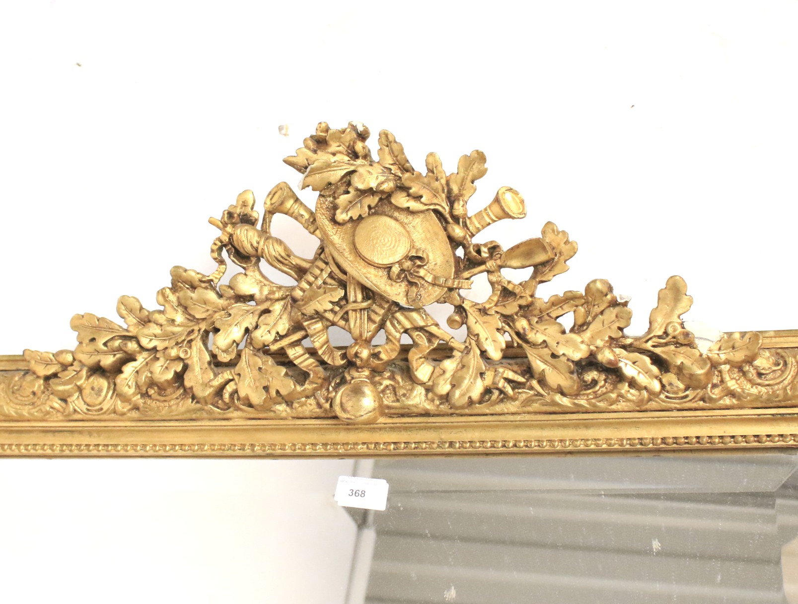 A large giltwood and gesso pier mirror. Late 19th century with some later elements. - Bild 2 aus 3