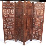 An Indian teak four fold screen/room divider.