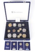 A box of modern coins including three silver proof £5 coins, etc.