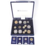 A box of modern coins including three silver proof £5 coins, etc.