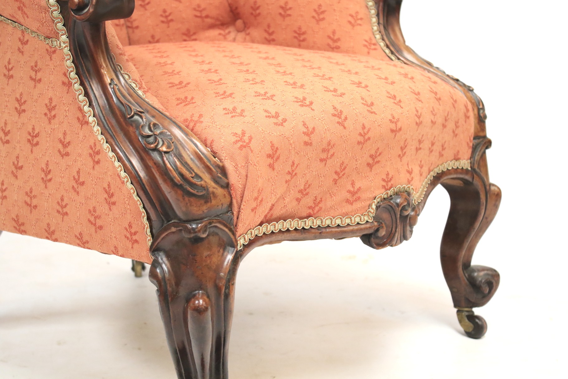 A Victorian upholstered mahogany button back armchair. - Image 2 of 2