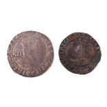 Two coins. James I shilling and a 1579 6d.