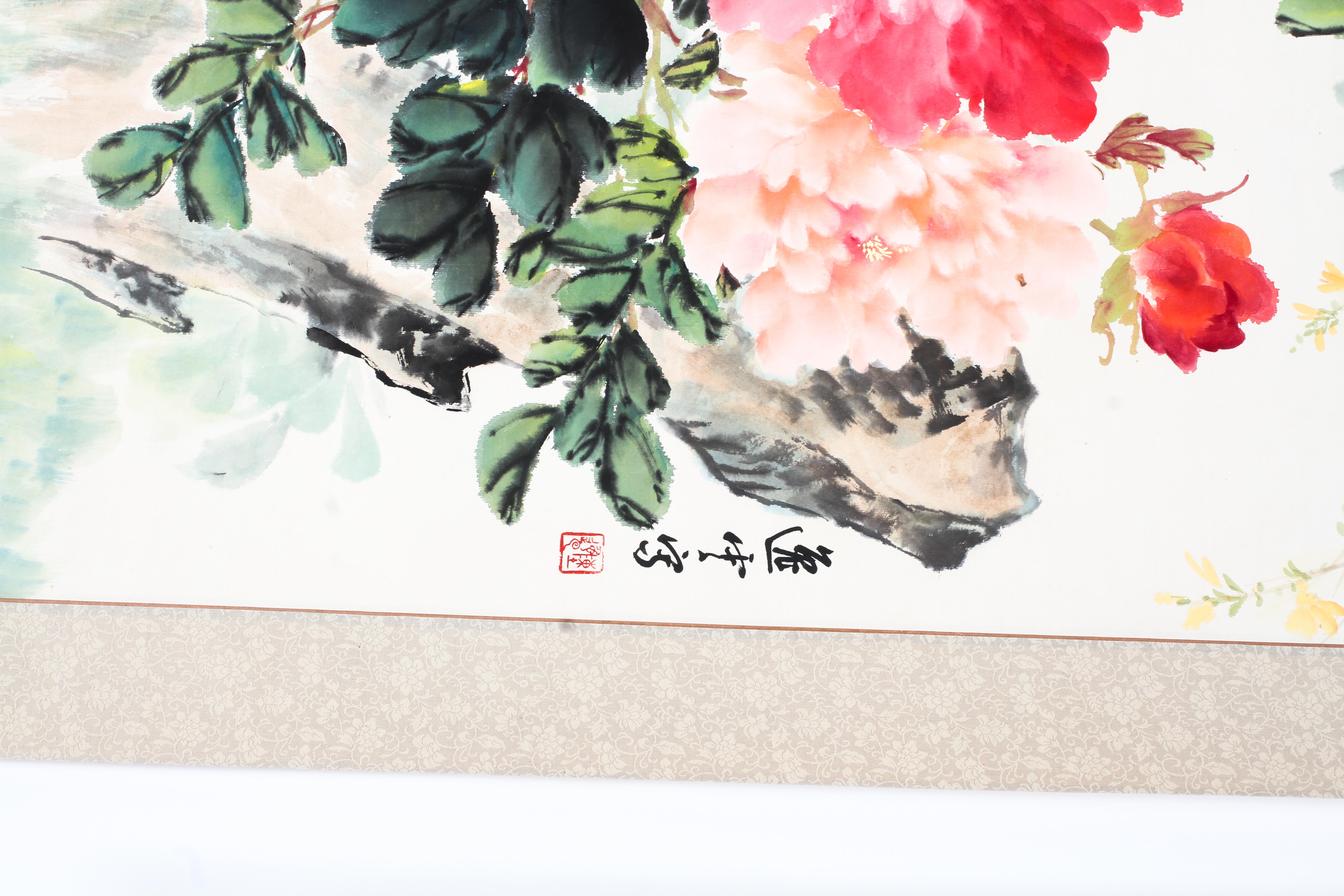 A Chinese scroll painting. Painted with pink peonies and foliage in watercolour on paper. - Image 2 of 2