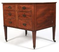An Edwardian Inlaid mahogany commode chest.