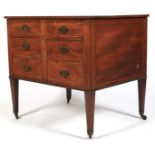 An Edwardian Inlaid mahogany commode chest.