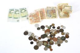 An assortment of coins and bank notes.