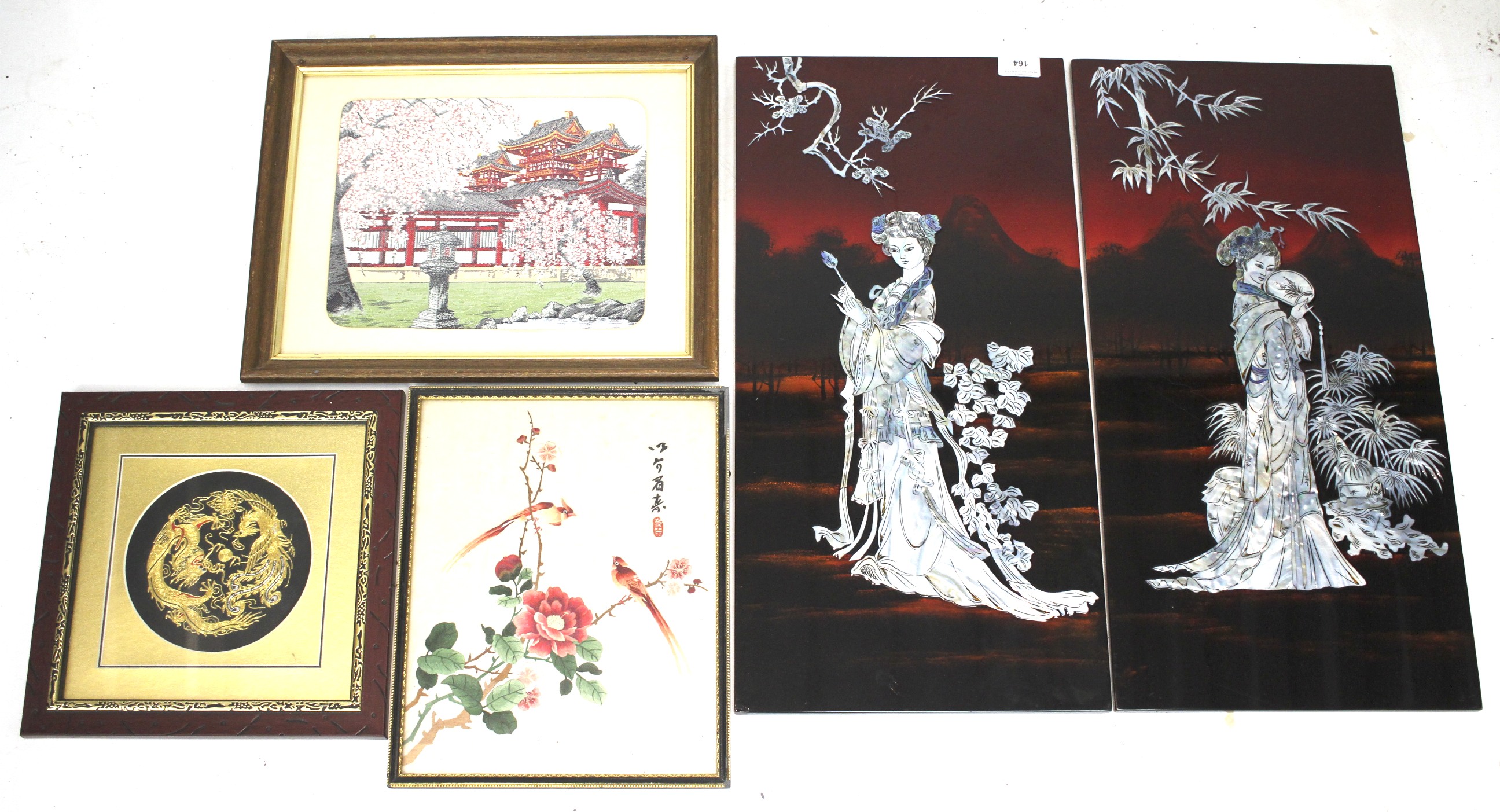 An assortment of Chinese needlework and two mother of pearl inlaid plaques depicting ladies
