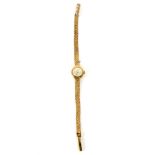 A vintage ladies 9ct gold wristwatch by Caravelle.