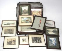 A suitcase of vintage watercolours, pictures and prints.