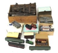 An assortment of toy train accessories and freight stock.