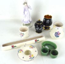 An assortment of ceramics. To include Poole pottery.