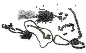 An assortment of Whitby Jet and similar items.