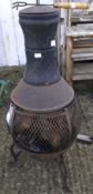 A vintage metal garden Chiminea.