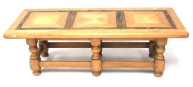 A contemporary rectangular coffee table.