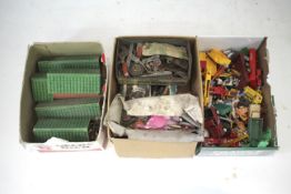 An assortment of playworn diecast and other toys.