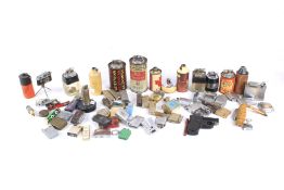 A large assortment of vintage novelty lighters.