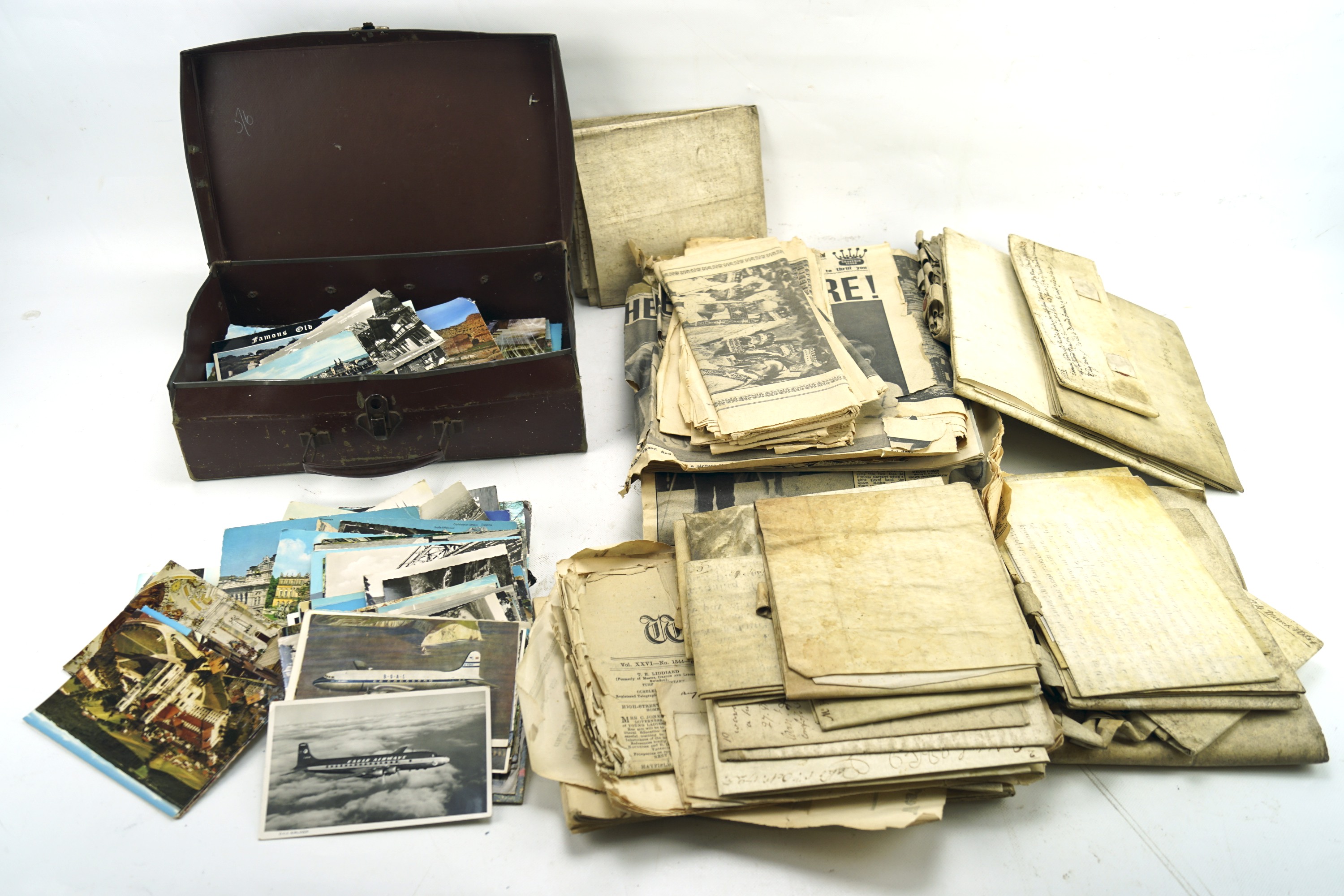 A box of assorted ephemera. Including Royal memorabilia, indentures and post cards.