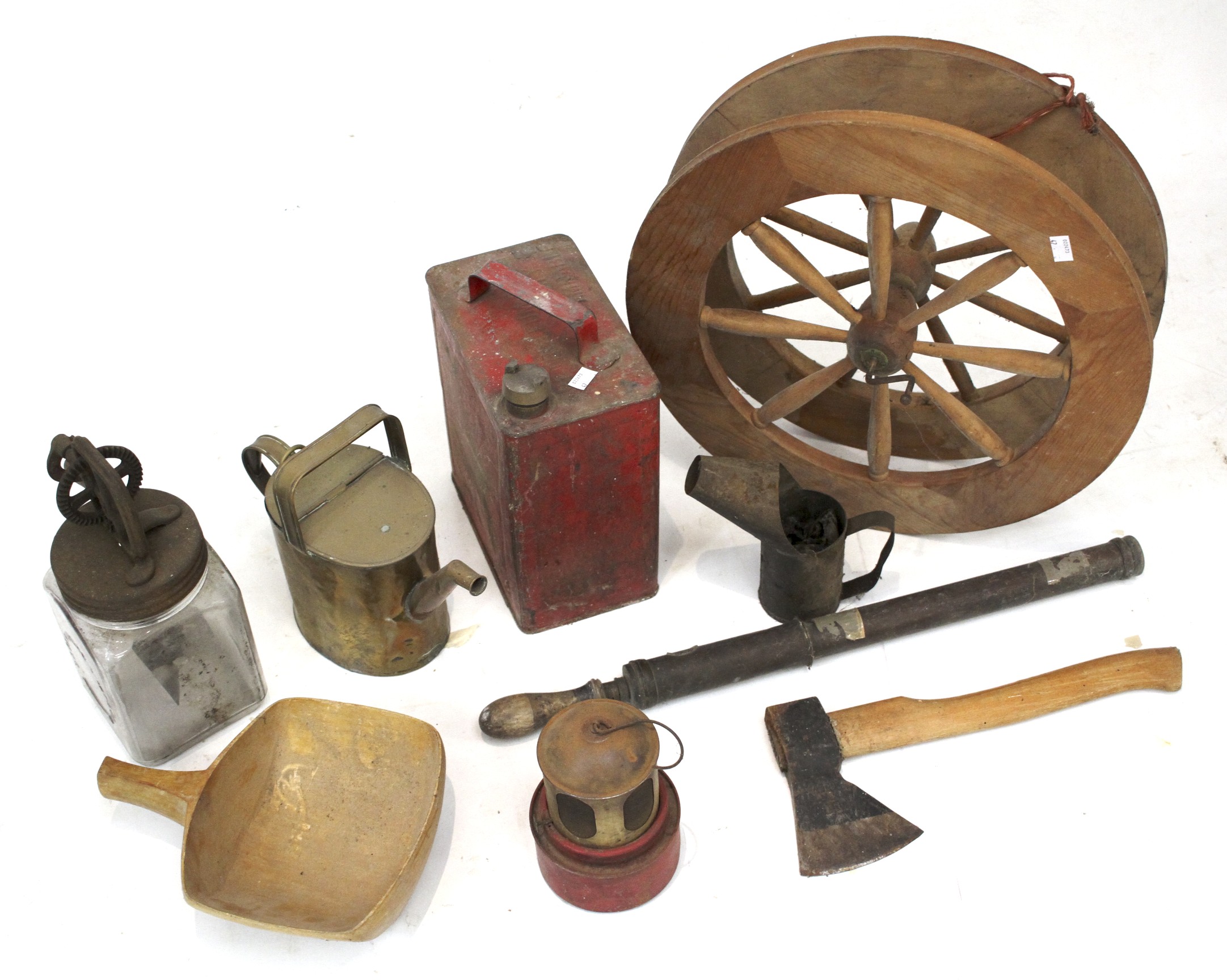 A box of mixed collectables. Including a petrol can water pump, and a pair of wooden wheels, etc.