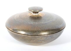 A 1930s Art Deco silver lidded pot.