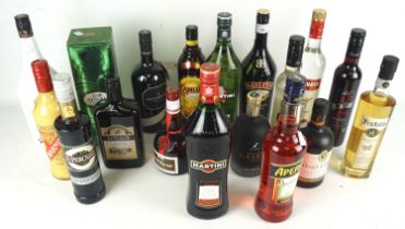 A collection of 18 bottles of alcohol. To include Cotswolds dry gin, 700ml 46% vol, Malibu, 1.
