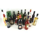 A collection of 18 bottles of alcohol. To include Cotswolds dry gin, 700ml 46% vol, Malibu, 1.