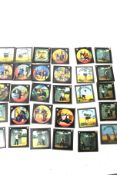 A collection of early 20th century magic lantern slides.