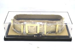 A Batman utility belt from PC Direct 2005, edition 112 of 750. In a Perspex box.