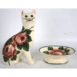 A Wemyss G Hill pottery figure of a cat together with a dish.