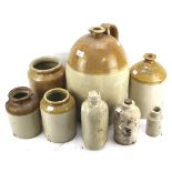 A collection of eight saltglaze stoneware pots and flagons.