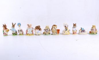 A collection of Beswick and Royal Albert Beatrix Potter figures.
