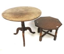 A small oak round table on tripod support and a coffee table.
