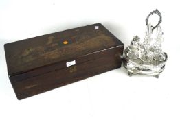 A 19th century mahogany writing slope and a Victorian silver plated six piece cruet stand.
