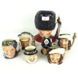 A collection of Royal Doulton character jugs.