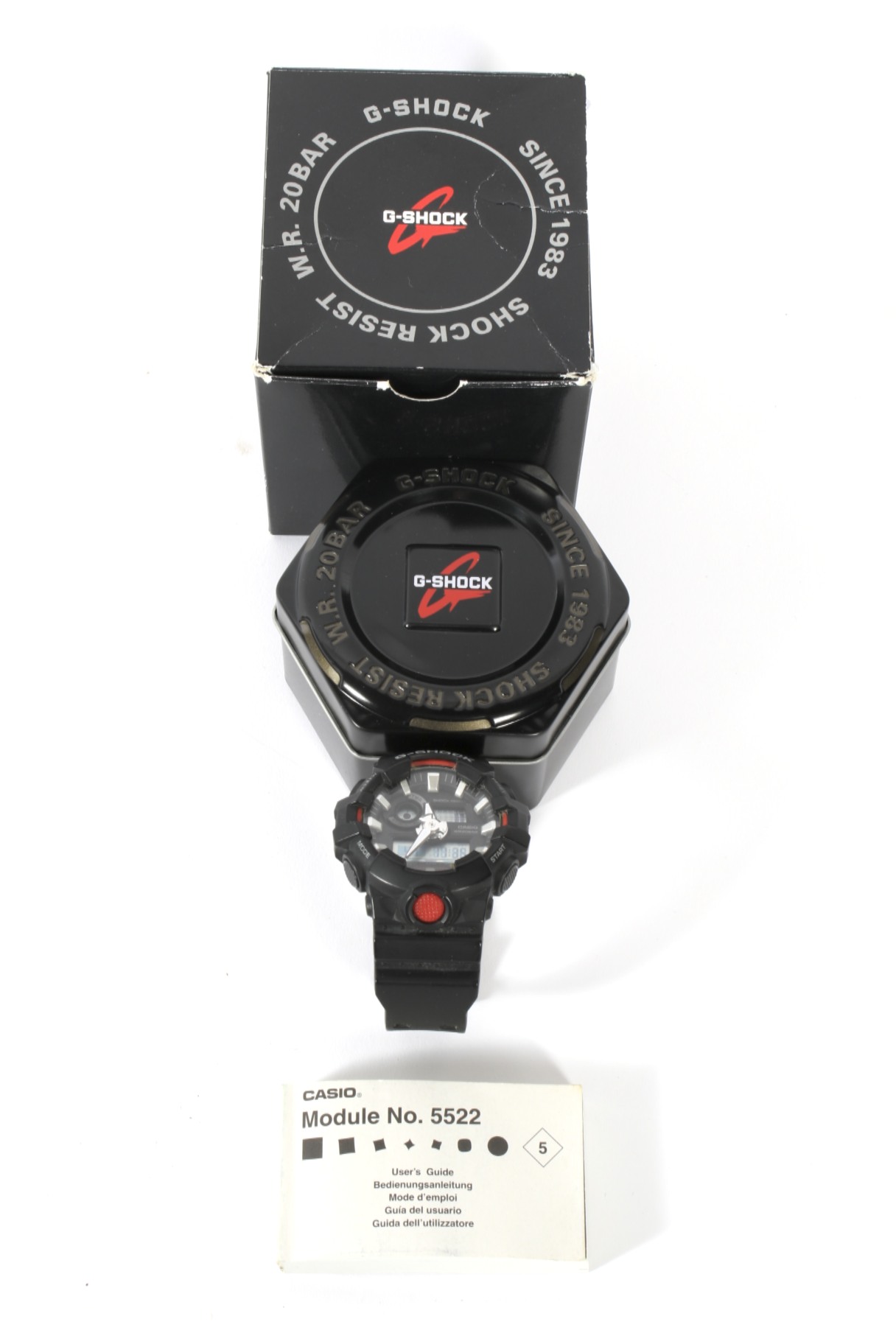 A modern Casio G-Shock WR20BAR wristwatch.