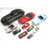 A collection of die cast model cars.