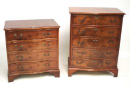 A pair of similar reproduction serpentine fronted chest of drawers.