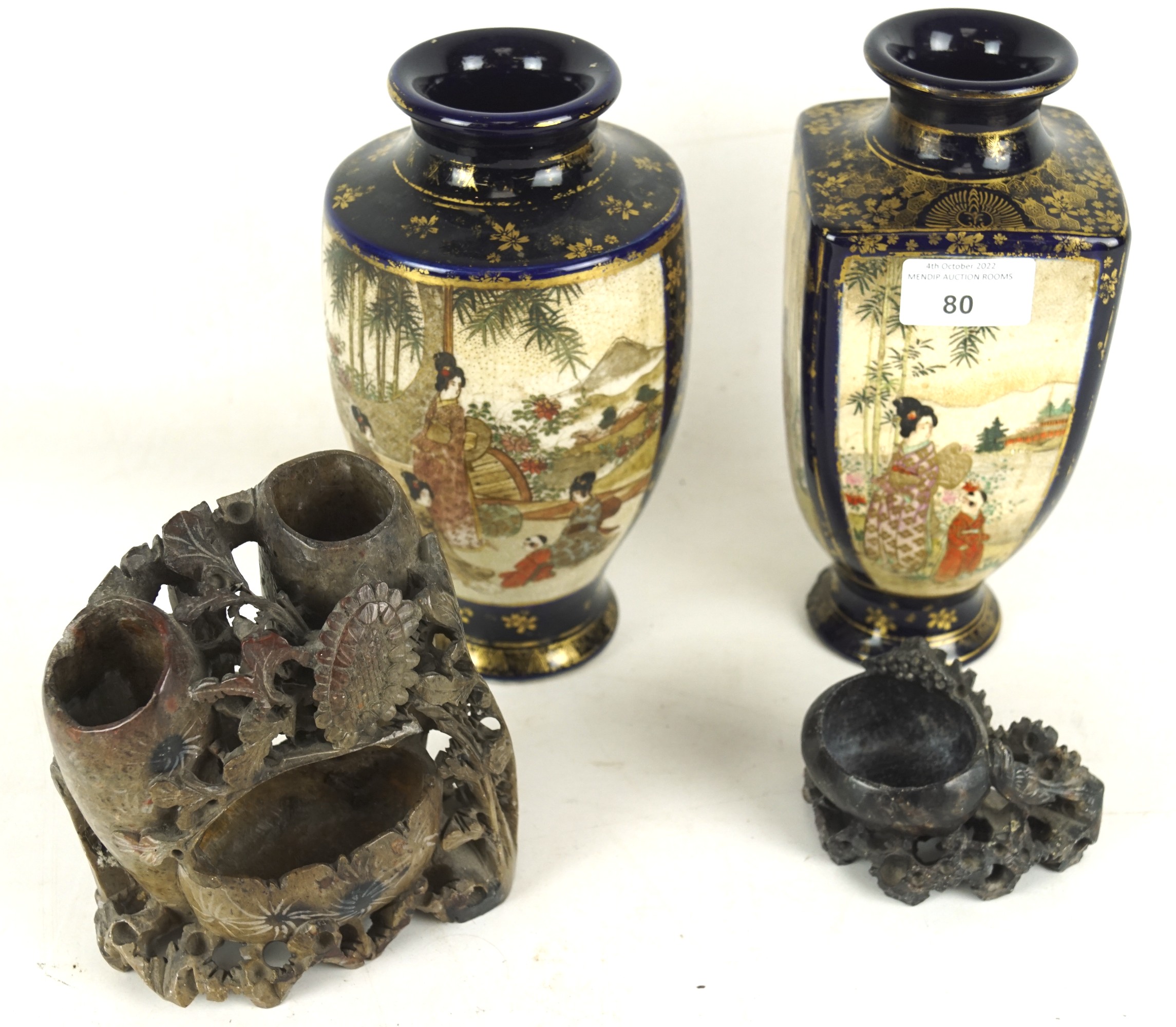 A pair of Japanese Meiji period vases and two Chinese soapstone carvings.