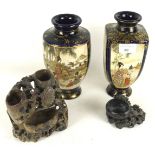A pair of Japanese Meiji period vases and two Chinese soapstone carvings.