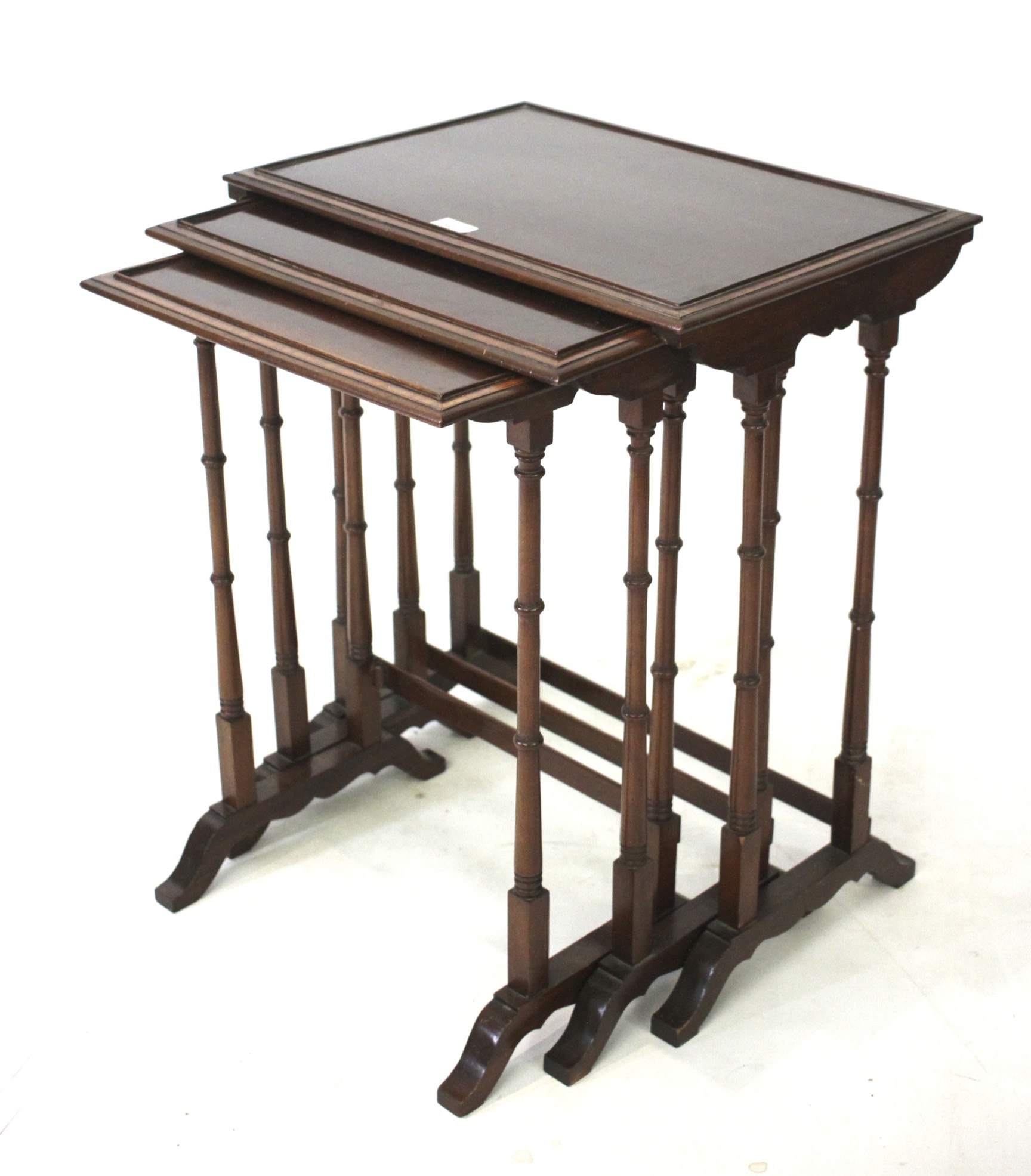A nest of three mahogany occasional tables. - Image 2 of 2