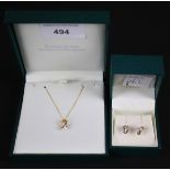 A modern 9ct gold set of earrings and necklace.