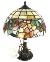 A 20th century Tiffany style table lamp with leaded glass shade.